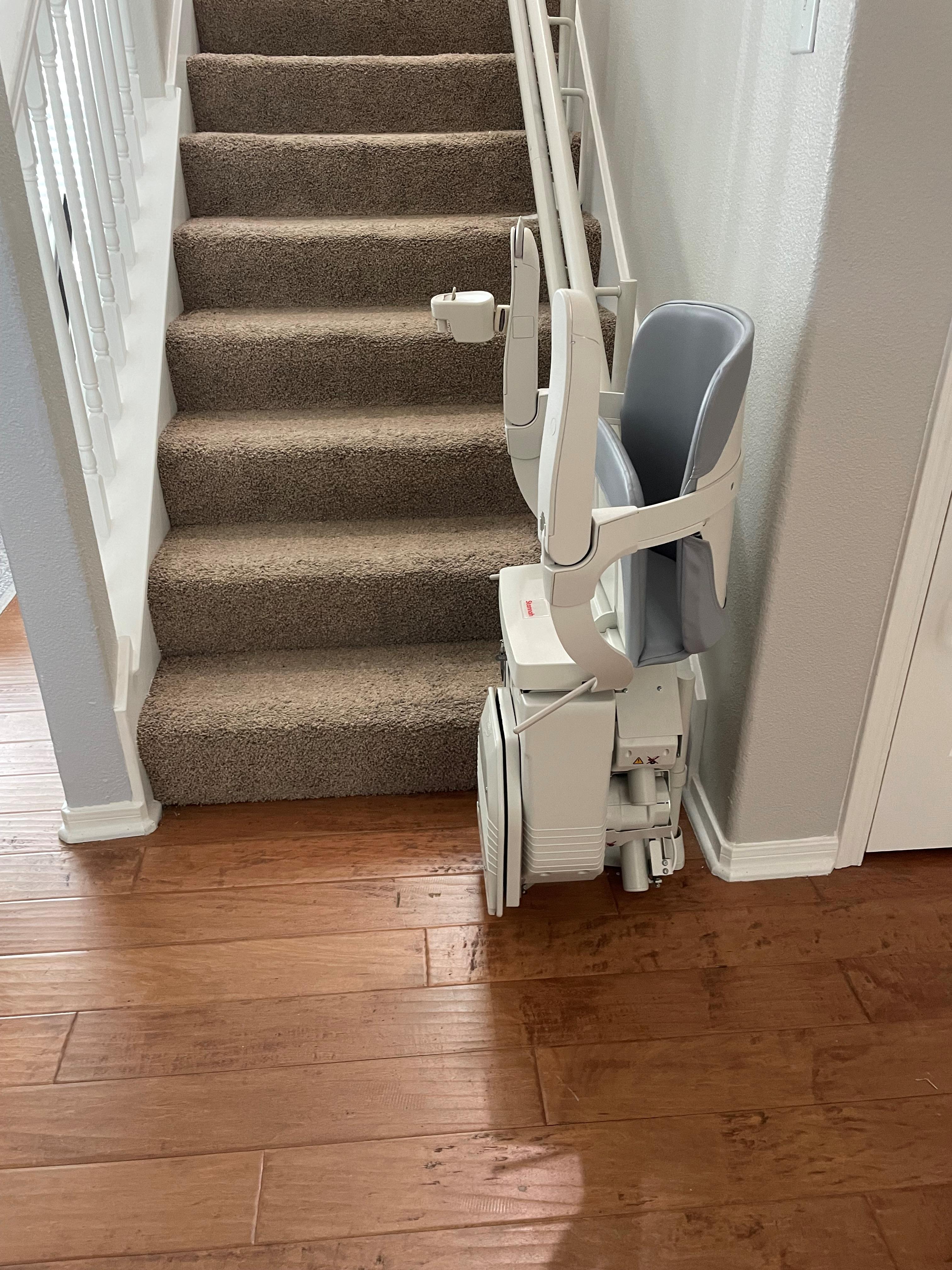 Stairlift folded up and out of the way.